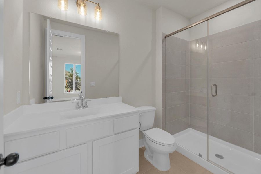 Furnished interior view inside a new home in Flora - 60', Hutto (Image 10).