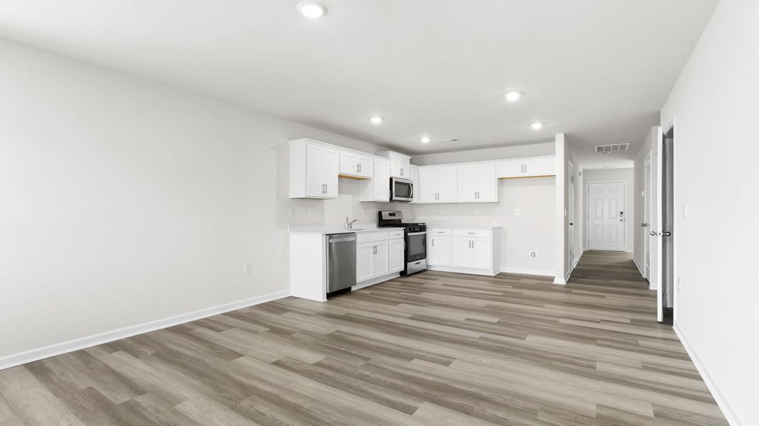 Spacious, unfurnished interior of a new home in Village Grove, Greenville (Image 11).