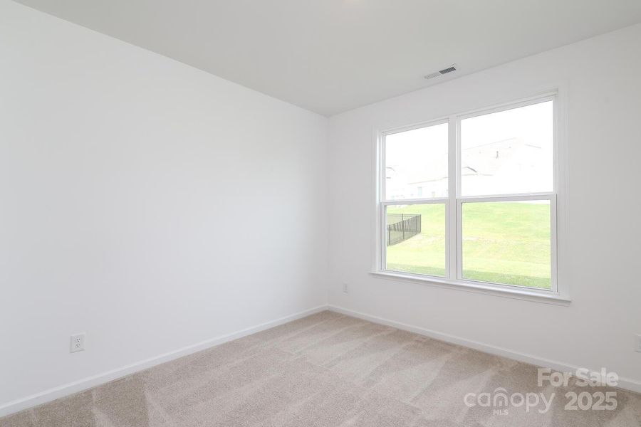 Spacious, unfurnished interior of a new home in Estates at Sugar Creek, Indian Land (Image 35).