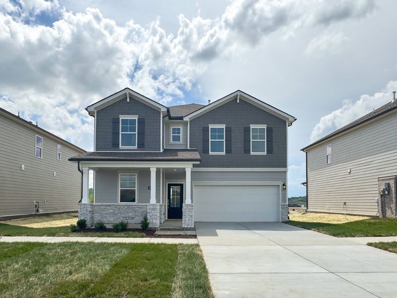 Front exterior of a new home in Canebrake at Hickory Hills, Old Hickory, TN, highlighting curb appeal (Image 1).
