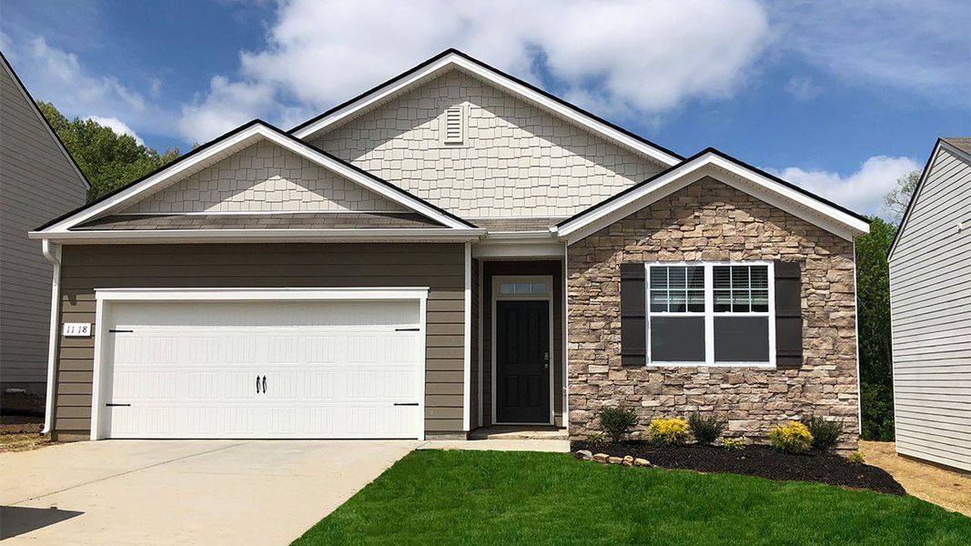Front exterior of a new home in Woodbridge Glen Single Family, Lebanon, TN, highlighting curb appeal (Image 1).