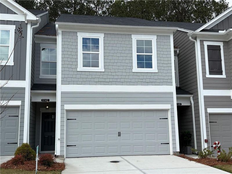Front exterior of a new home in , Decatur, GA, highlighting curb appeal (Image 1). Front exterior of a new home in , Decatur, GA, highlighting curb appeal (Image 1).
