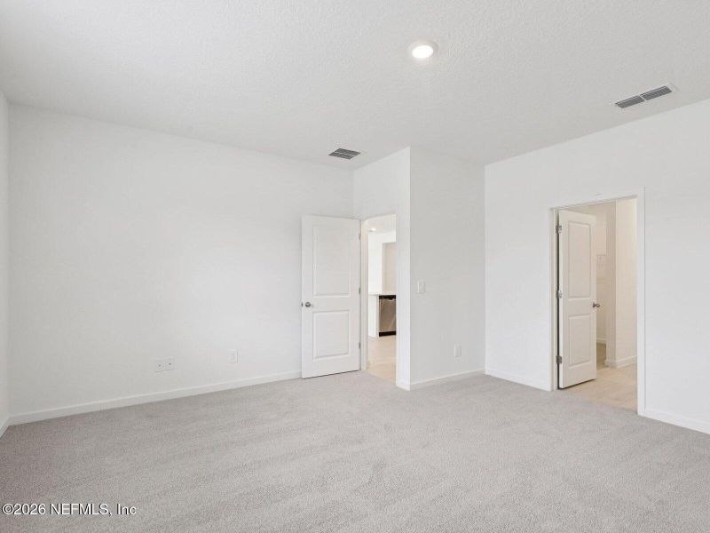 Spacious, unfurnished interior of a new home in Cypress Meadows - Signature Series, Jacksonville (Image 9).