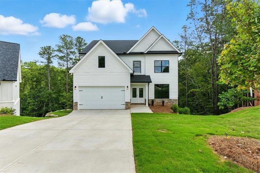 Front exterior of a new home in , Cartersville, GA, highlighting curb appeal (Image 2). Front exterior of a new home in , Cartersville, GA, highlighting curb appeal (Image 2).