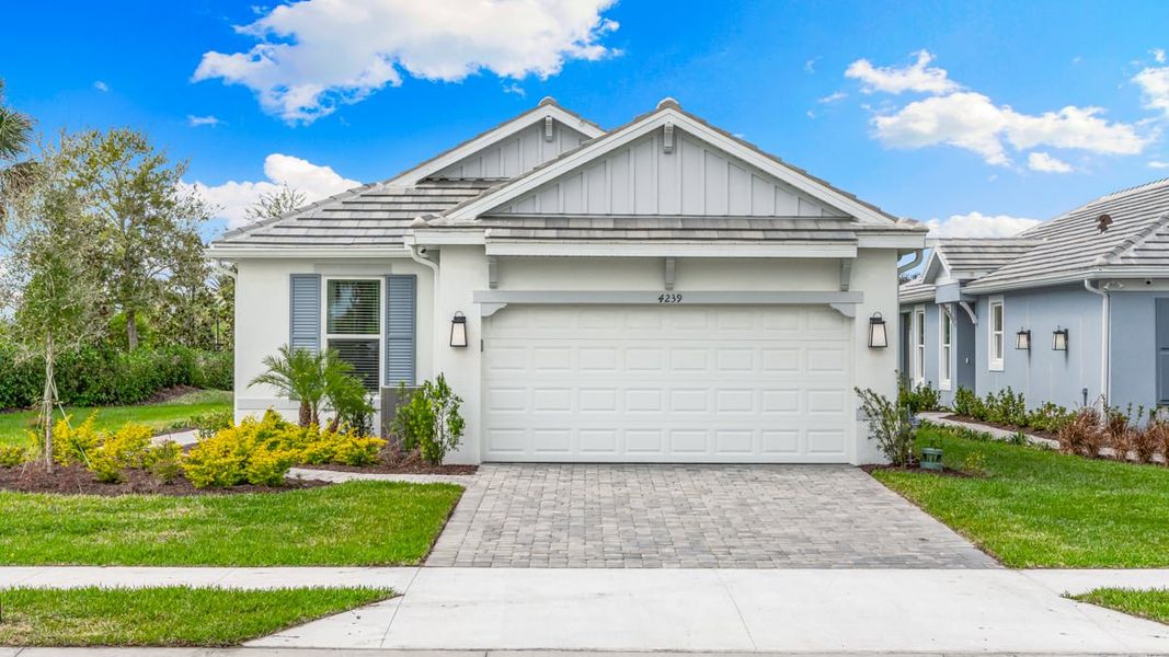 Representative exterior photo of a completed home built from the Arezzo by Taylor Morrison in Esplanade at Wiregrass Ranch, Wesley Chapel, FL (Image 19). Representative exterior photo of a completed home built from the Arezzo by Taylor Morrison in Esplanade at Wiregrass Ranch, Wesley Chapel, FL (Image 19).