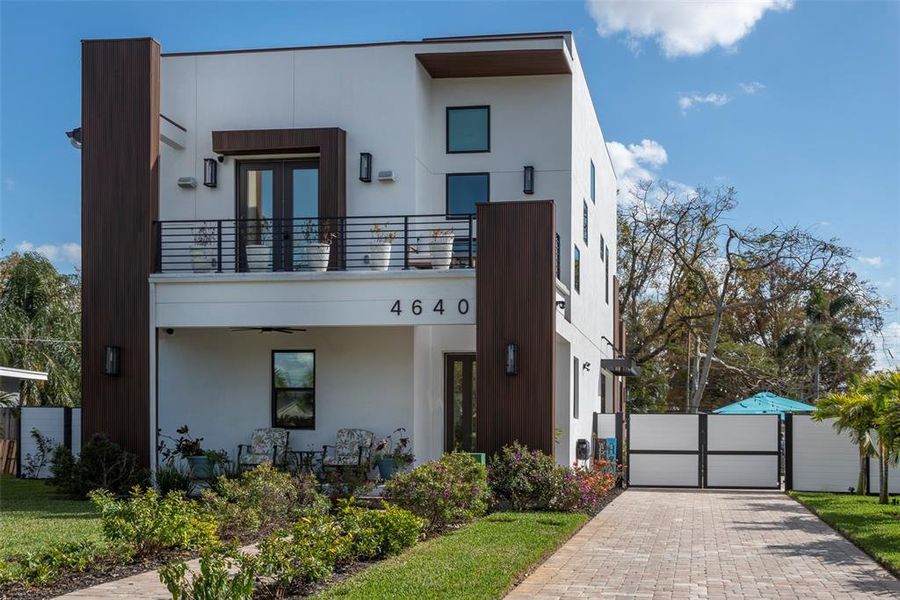 Front exterior of a new home in , St. Petersburg, FL, highlighting curb appeal (Image 24). Front exterior of a new home in , St. Petersburg, FL, highlighting curb appeal (Image 24).