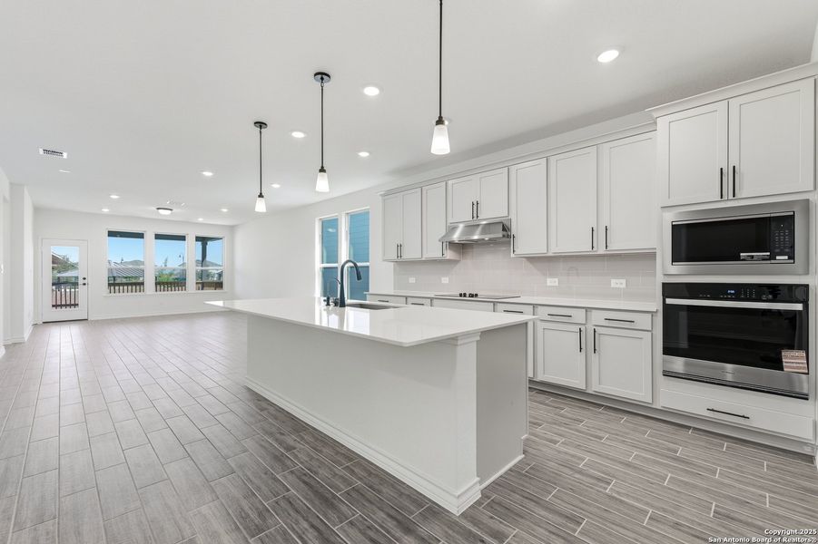 Furnished interior view inside a new home in Bison Ridge, San Antonio (Image 4).