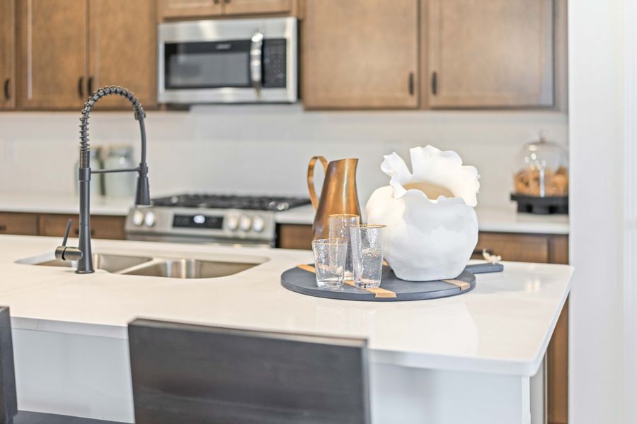 **These photos are examples of a different home with the same floorplan. Interior and exterior may differ.**