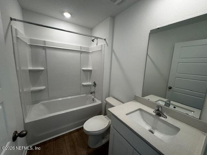 Furnished interior view inside a new home in Copes Landing, Jacksonville (Image 34).