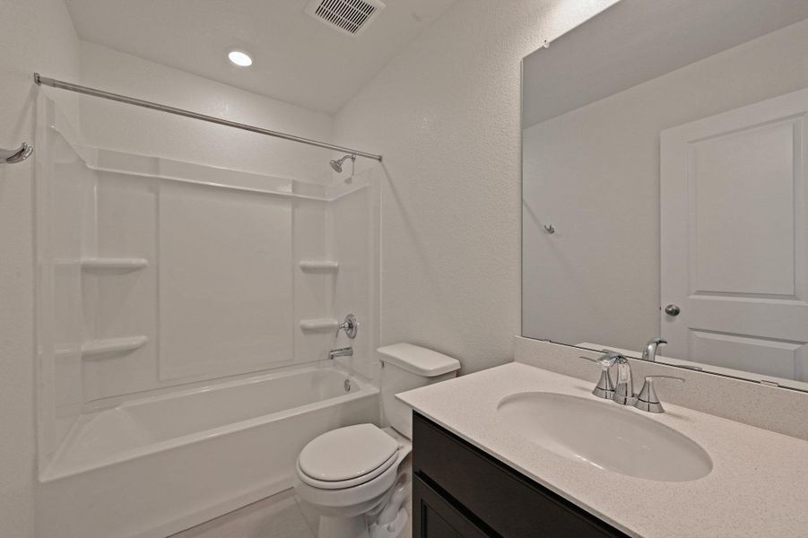 Furnished interior view inside a new home in Stoney Chase, Del Valle (Image 9).