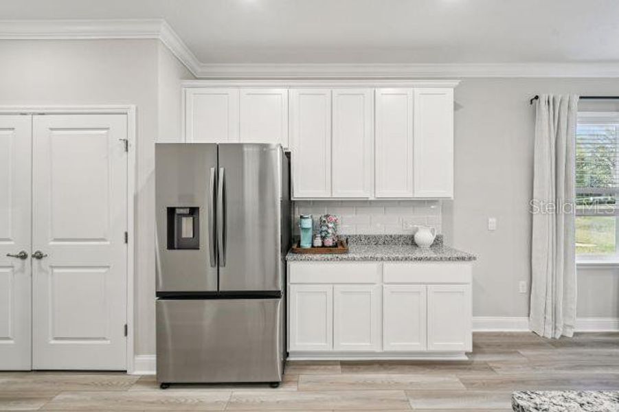 Furnished interior view inside a new home in , Mount Plymouth (Image 11).