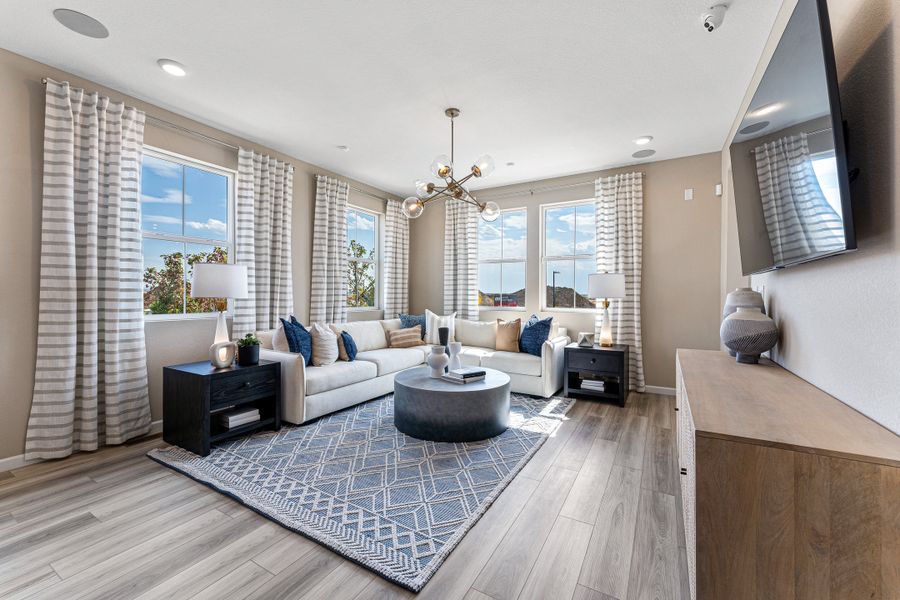 Furnished interior view inside a new home in The Aurora Highlands, Aurora (Image 3).