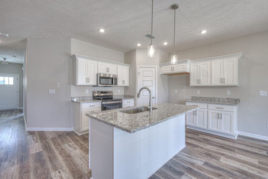 Furnished interior in a model home at Fox Run in Manchester (Image 5).