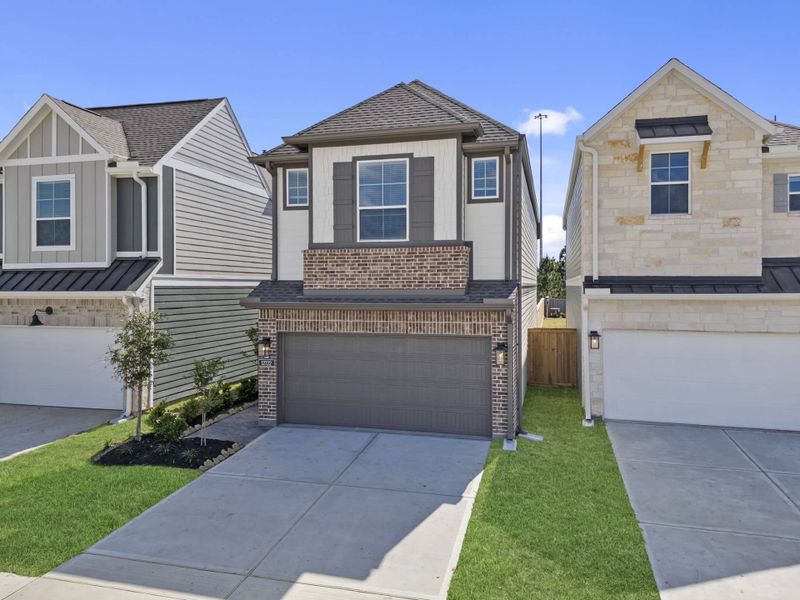 Front exterior of a new home in Bridgeland, Cypress, TX, highlighting curb appeal (Image 23). Front exterior of a new home in Bridgeland, Cypress, TX, highlighting curb appeal (Image 23).