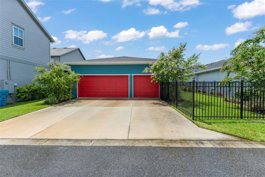 Front exterior of a new home in , Orlando, FL, highlighting curb appeal (Image 24).