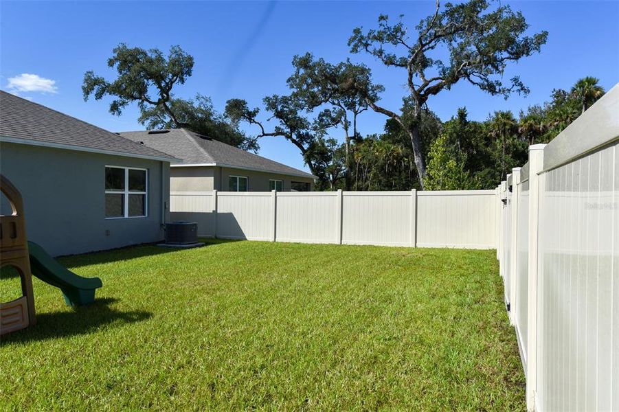 Exterior details and patio area of a home in Oak Leaf Preserve, New Smyrna Beach (Image 23). Exterior details and patio area of a home in Oak Leaf Preserve, New Smyrna Beach (Image 23).
