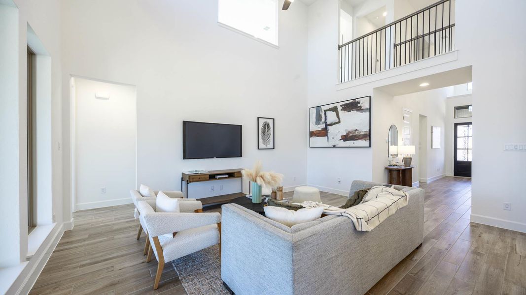 Furnished interior view inside a new home in Santa Rita Ranch Tierra Rosa, Liberty Hill (Image 6). Furnished interior view inside a new home in Santa Rita Ranch Tierra Rosa, Liberty Hill (Image 6).