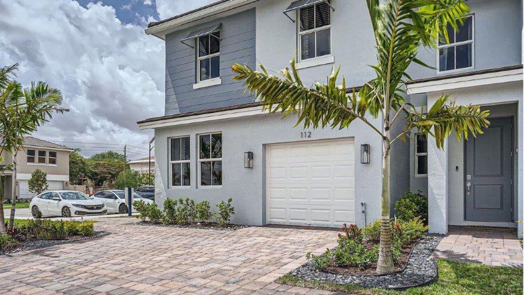 Representative exterior photo of a completed home built from the Denali by D.R. Horton in Parker Pointe, Homestead, FL (Image 2). Representative exterior photo of a completed home built from the Denali by D.R. Horton in Parker Pointe, Homestead, FL (Image 2).
