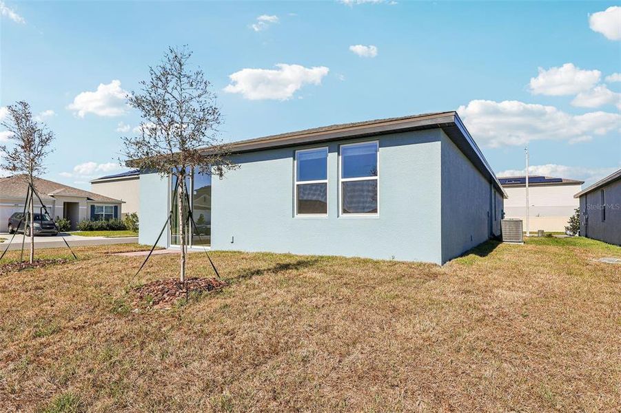 Exterior details and patio area of a home in Lake Deer Estates - Classic Series, Poinciana (Image 20).