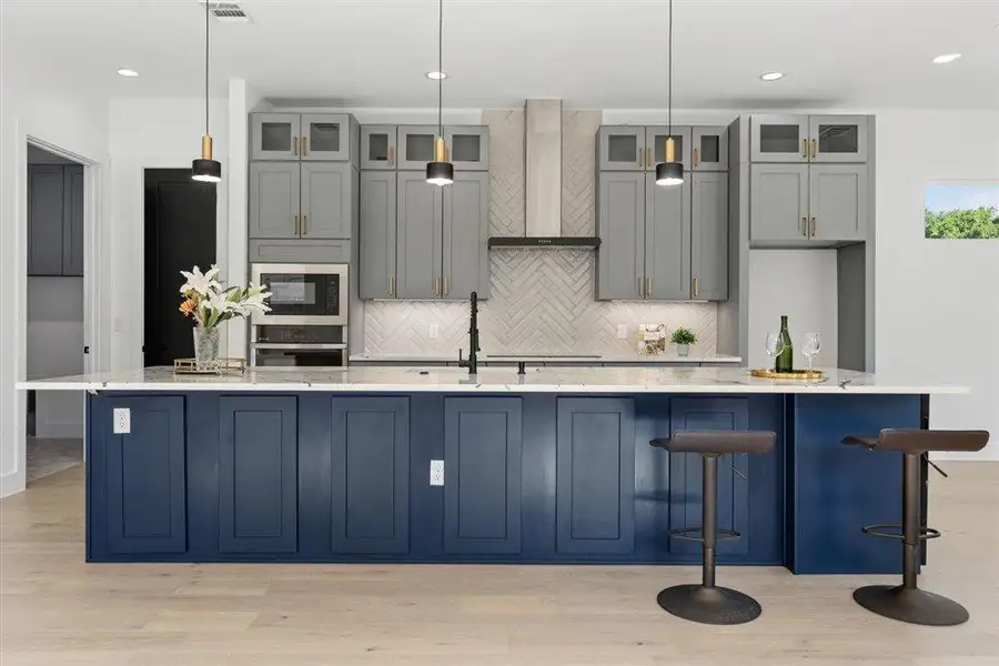 Furnished interior view inside a new home in , Manor (Image 5).