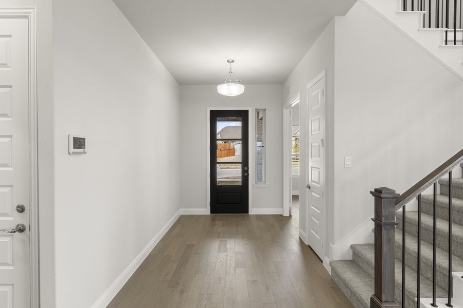 Representative unfurnished interior of a home built from the Sherman by Windsor Homes in Anna Town Square, Anna (Image 12).