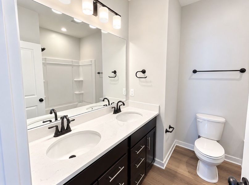 Furnished interior view inside a new home in Hickory Cove, Burns (Image 6).