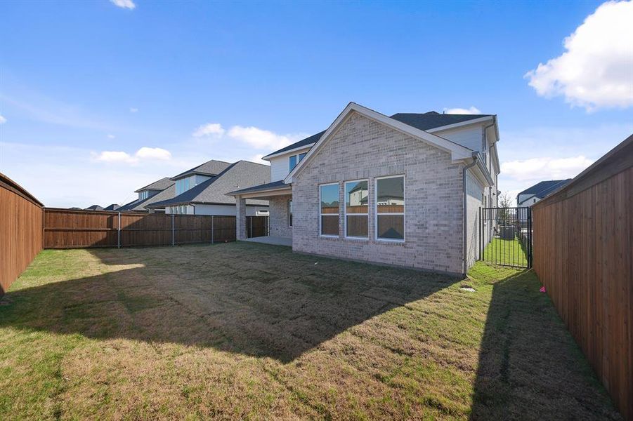 Exterior details and patio area of a home in Brookhollow West, Prosper (Image 3).