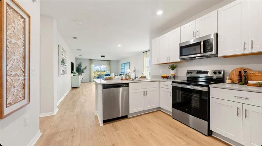 Furnished interior view inside a new home in Waterstone, Groveland (Image 4).