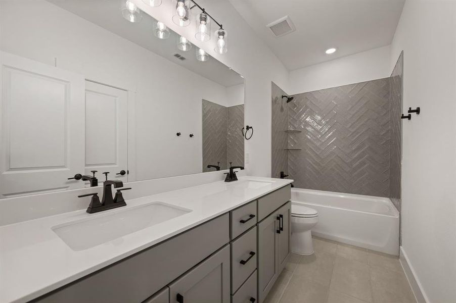 Friends and family will enjoy having their own space in this lovely guest bath!