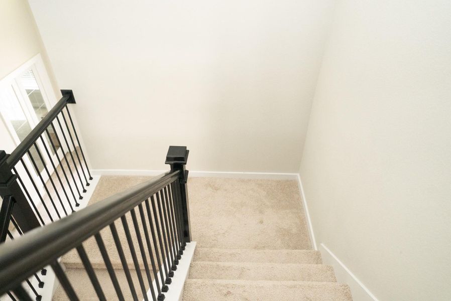 Spacious, unfurnished interior of a new home in Sunterra, Katy (Image 28).