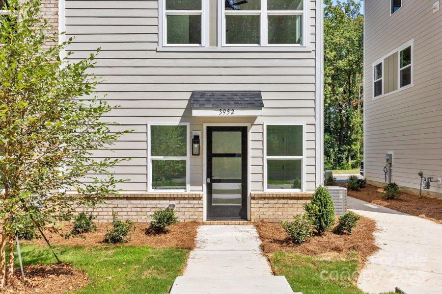 Exterior details and patio area of a home in , Charlotte (Image 3). Exterior details and patio area of a home in , Charlotte (Image 3).