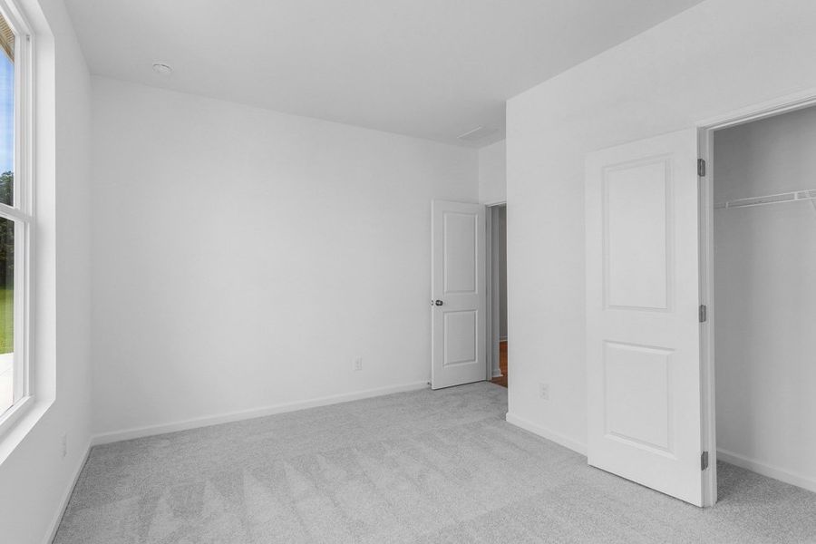 Representative unfurnished interior of a home built from the Moreland by Taylor Morrison in Weatherfield, Buford (Image 26).