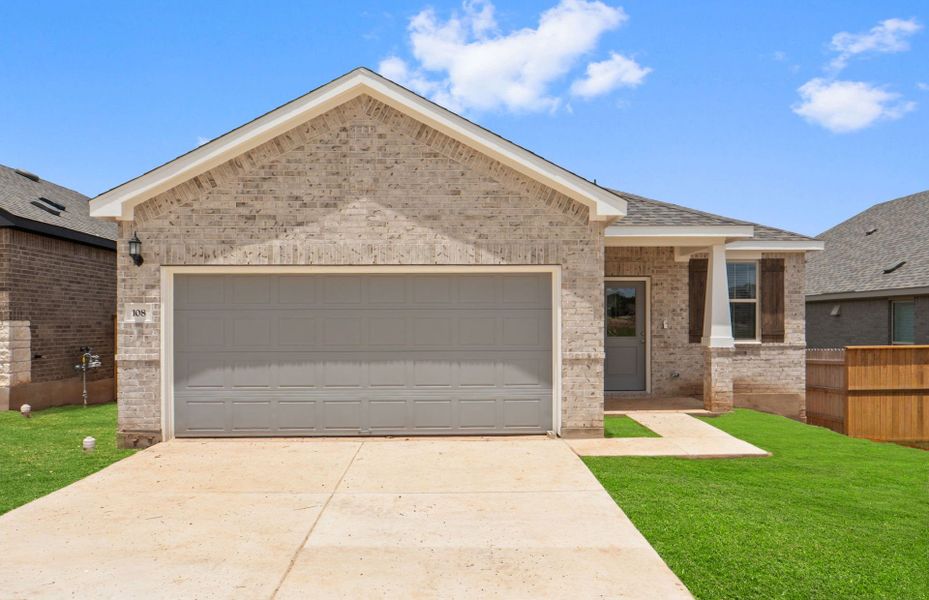 Front exterior of a new home in La Cima, San Marcos, TX, highlighting curb appeal (Image 25).
