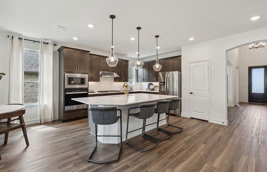 *Model representation. Some features and options may differ - Spacious kitchen with eat-in bartop island *Model representation. Some features and options may differ - Spacious kitchen with eat-in bartop island