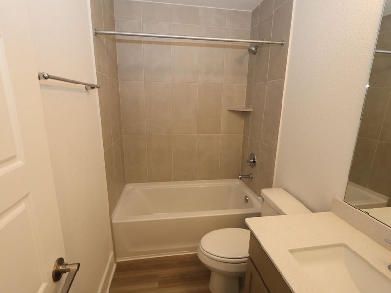 Furnished interior view inside a new home in Lone Star Landing, Montgomery (Image 11).