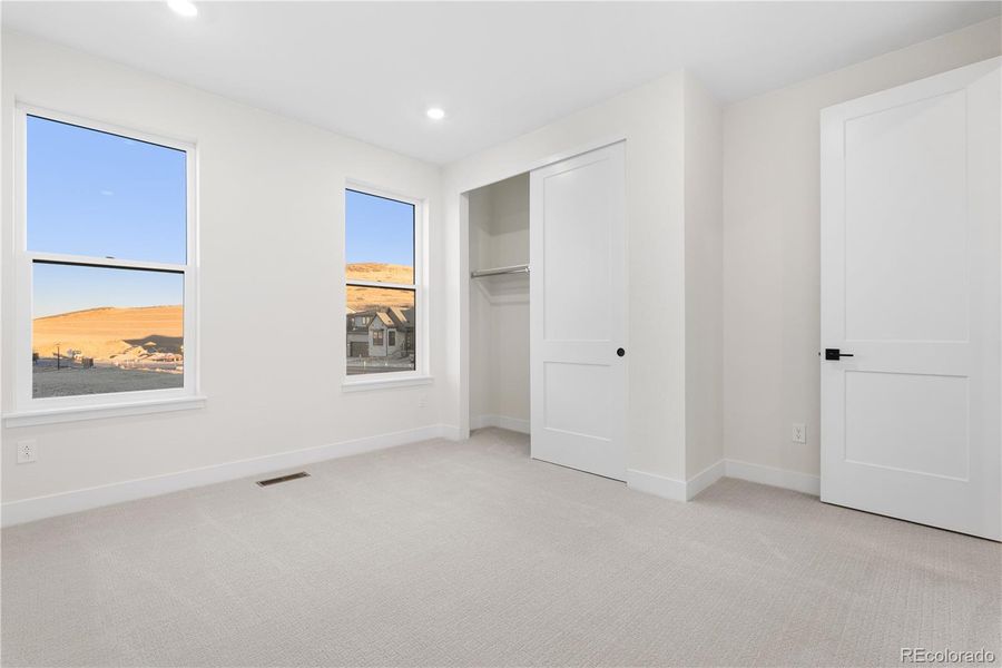 Spacious, unfurnished interior of a new home in Autograph at Lyric, Lone Tree (Image 44).