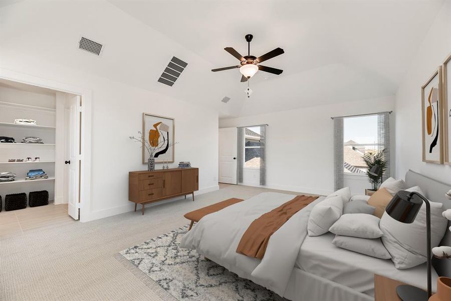 Bedroom featuring light carpet, ceiling fan, and vaulted ceiling