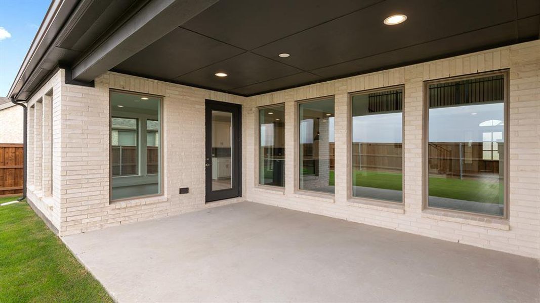 Exterior details and patio area of a home in Myrtle Creek 71', Waxahachie (Image 3).