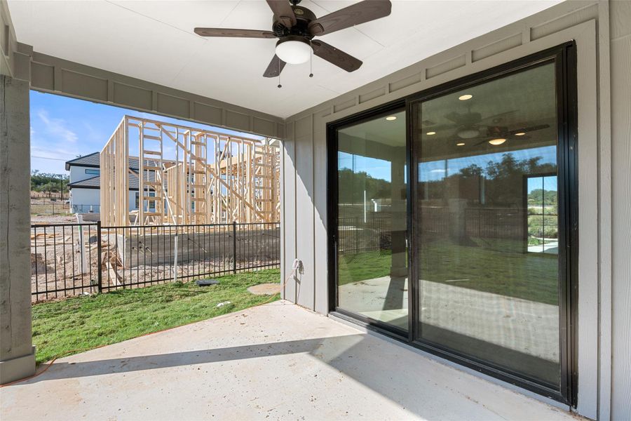 Exterior details and patio area of a home in Brahmans Draw, Spicewood (Image 18).