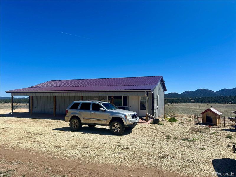 Front exterior of a new home in , Westcliffe, CO, highlighting curb appeal (Image 10).