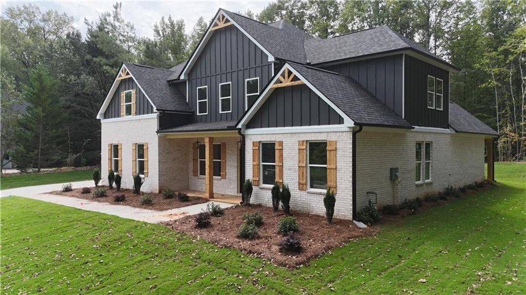 Front exterior of a new home in , Monroe, GA, highlighting curb appeal (Image 19). Front exterior of a new home in , Monroe, GA, highlighting curb appeal (Image 19).