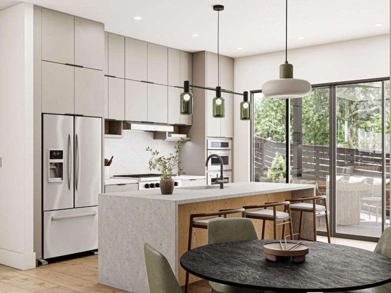 Contemporary kitchen featuring a large waterfall island with integrated seating, stainless steel appliances, and abundant cabinet storage