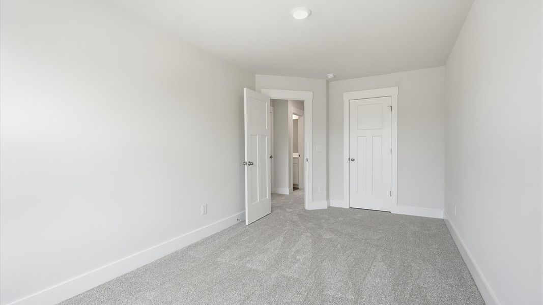 First-class secondary bedroom with comfortable carpeted flooring and generous closet space in Greenville, SC First-class secondary bedroom with comfortable carpeted flooring and generous closet space in Greenville, SC