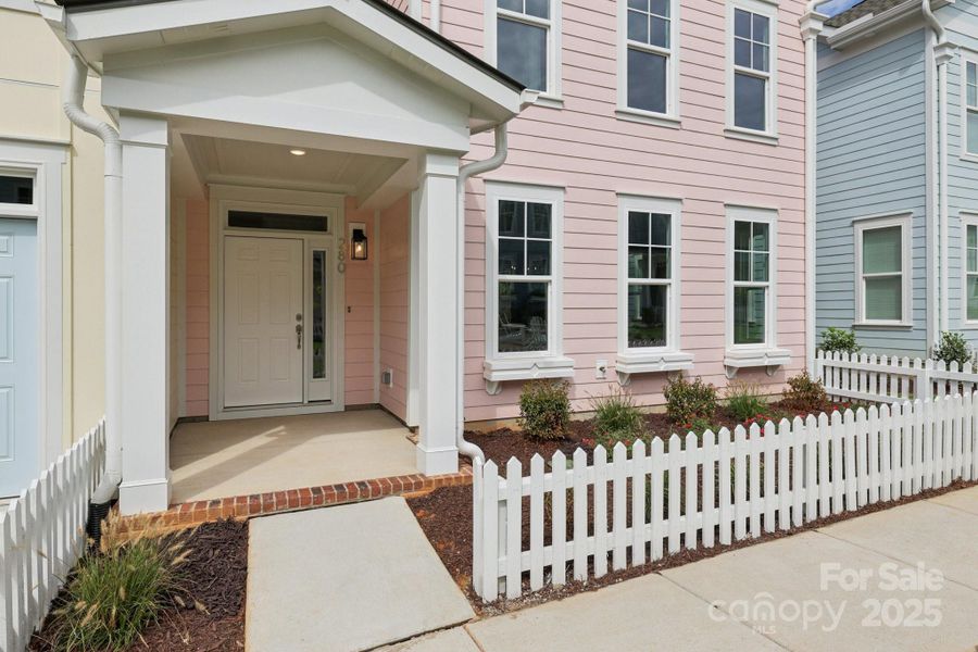 Exterior details and patio area of a home in Walk23, Huntersville (Image 23).