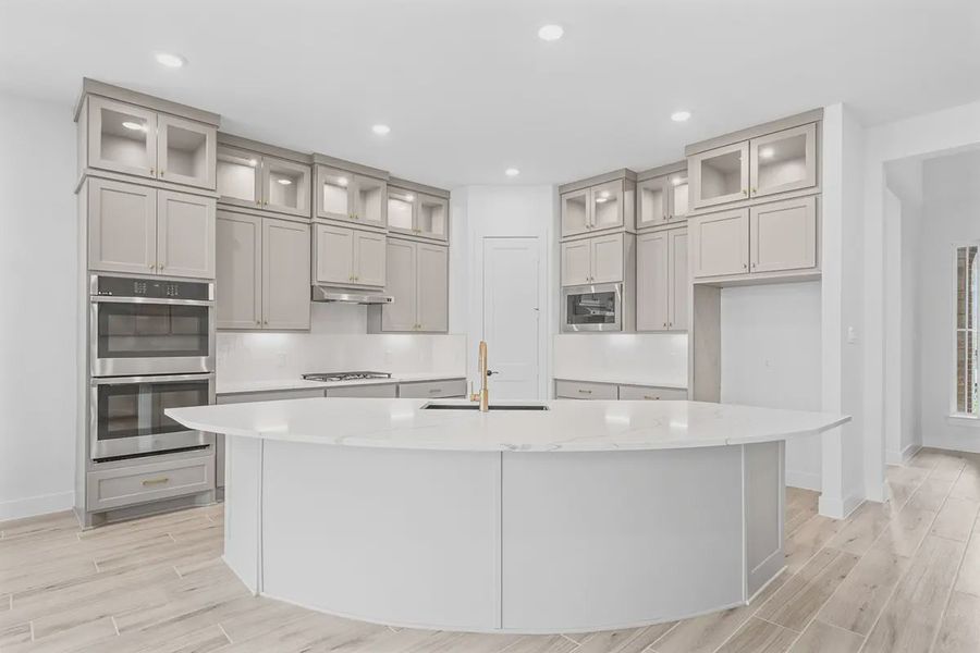 Representative furnished interior of a home built from the Madison by Chesmar Homes in Grange, Katy (Image 10).
