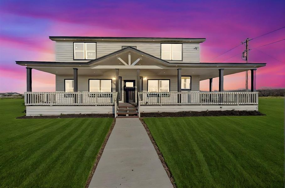 View of front of house featuring a porch and a front lawn View of front of house featuring a porch and a front lawn
