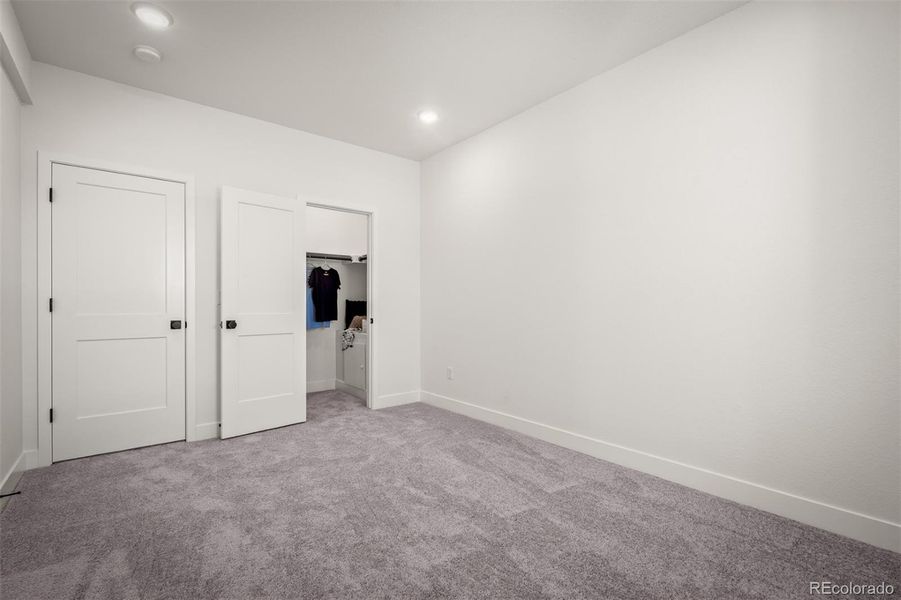 Spacious, unfurnished interior of a new home in Revel Crossing at Wolf Ranch - The Panorama Collection, Colorado Springs (Image 31).