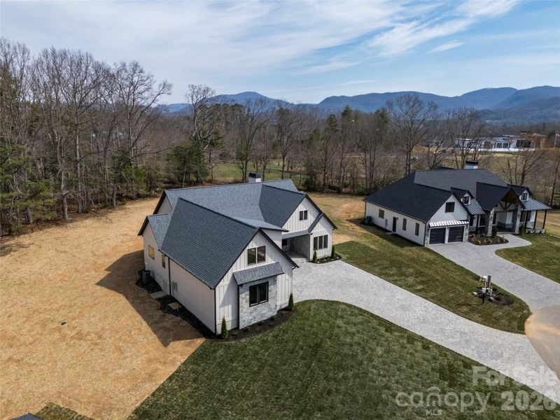 Front exterior of a new home in , Fletcher, NC, highlighting curb appeal (Image 24).