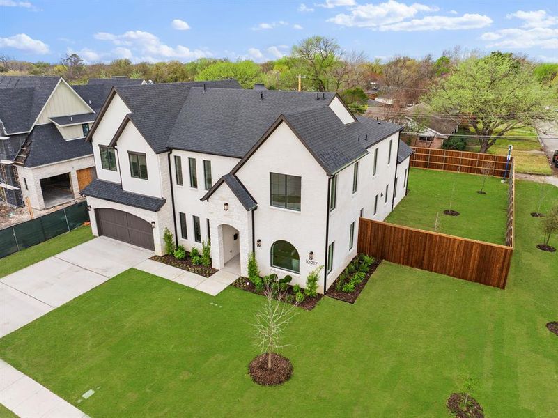 Front exterior of a new home in , Dallas, TX, highlighting curb appeal (Image 1). Front exterior of a new home in , Dallas, TX, highlighting curb appeal (Image 1).