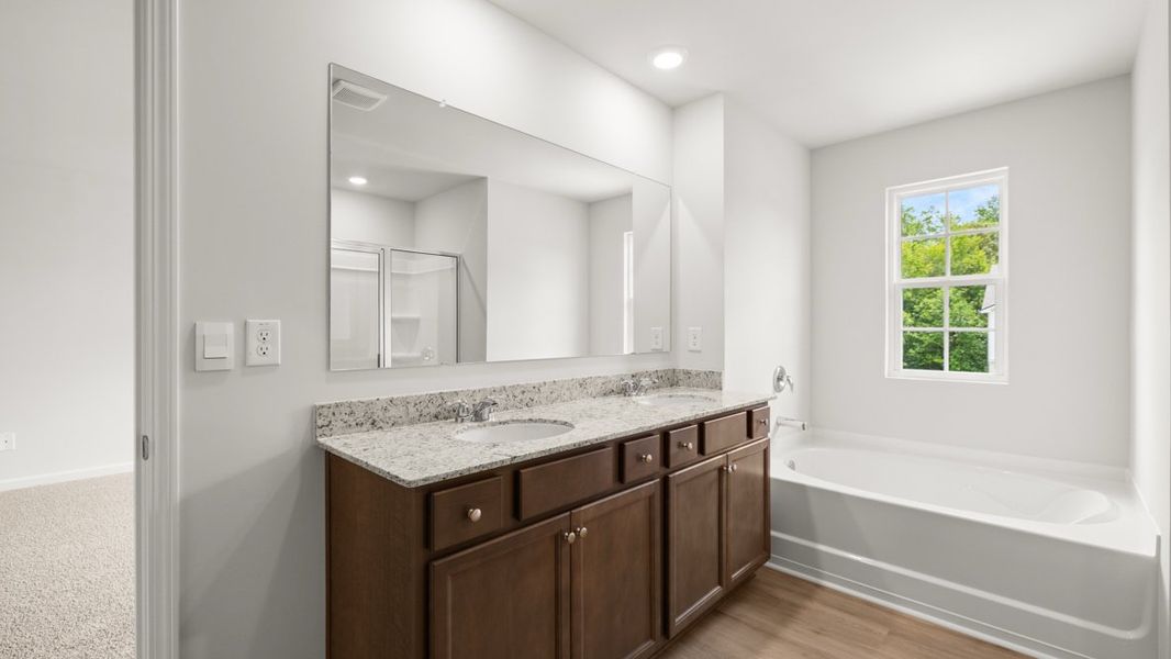 Representative furnished interior of a home built from the Hayden by D.R. Horton in Northwoods at Mirror Lake, Villa Rica (Image 12).
